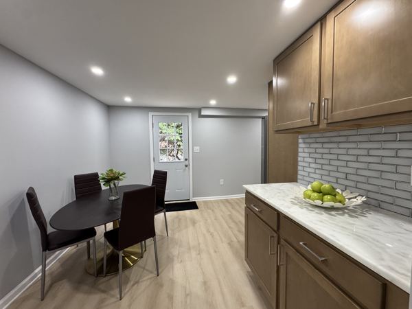 Eat-in kitchen: breakfast area with side door